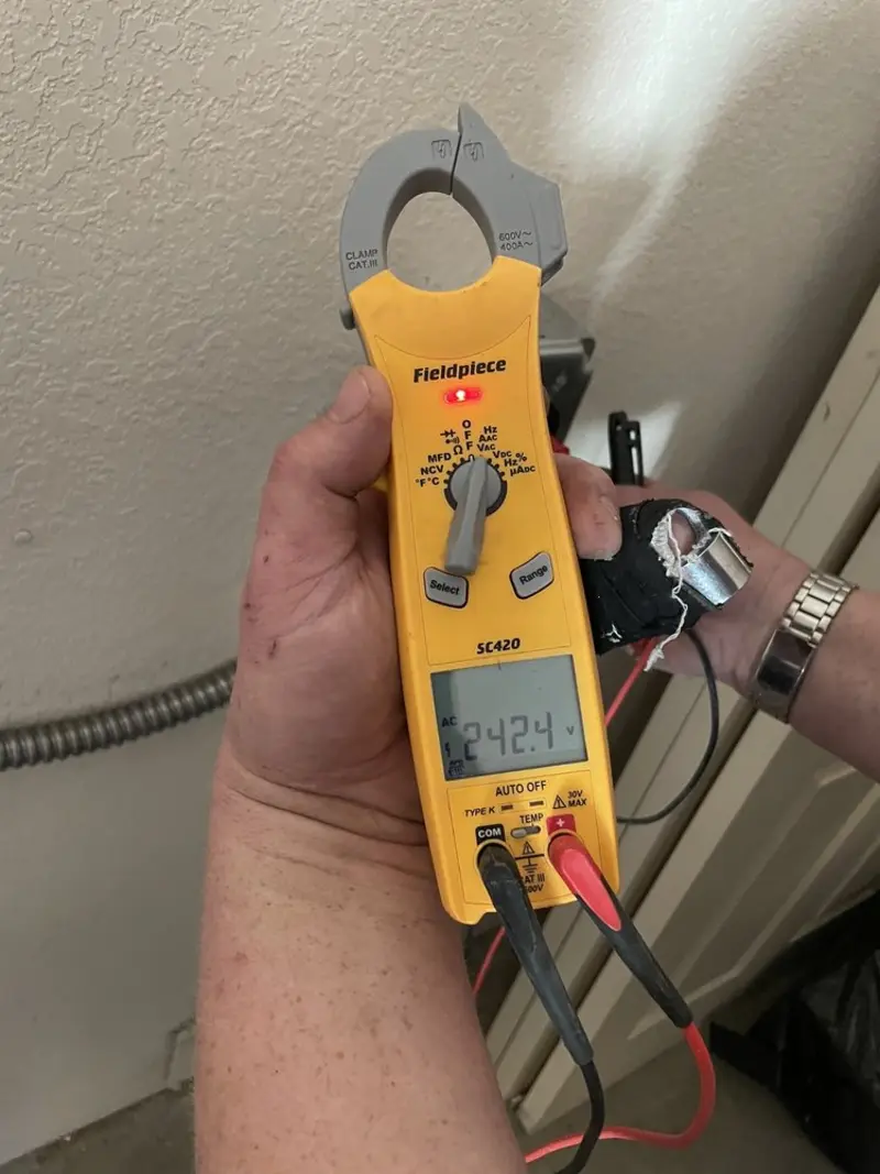Voltage testing with clamp meter during Generator Installation in Laketon